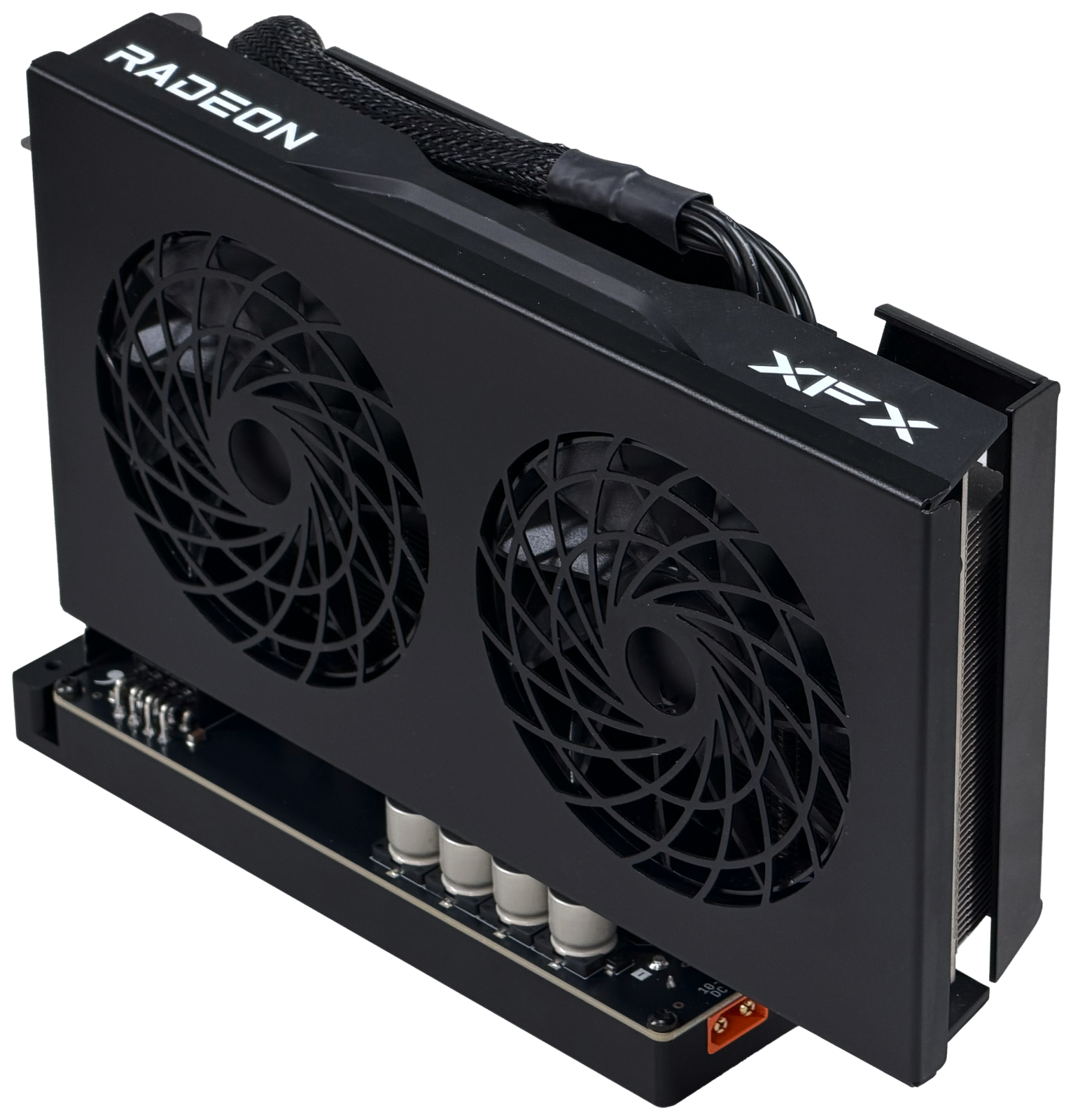 An AMD Radeon RX 9060 graphics card seated in a chestnut board.