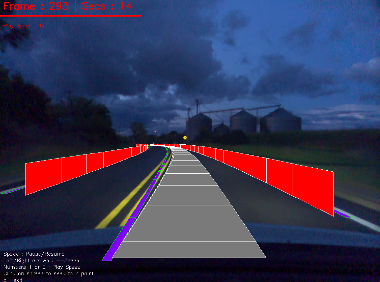 Night road scene with incorrect double-yellow lane predictions.