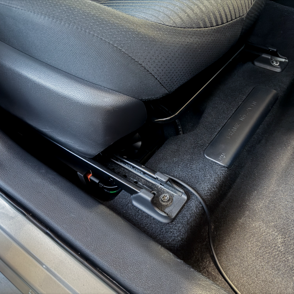 chestnut and GPU mounted under a car seat
